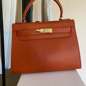 Kelly bag by Teddy Blake